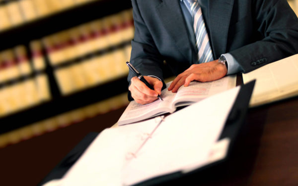 Business Lawyer Bergen County, NJ - lawyer at desk taking notes