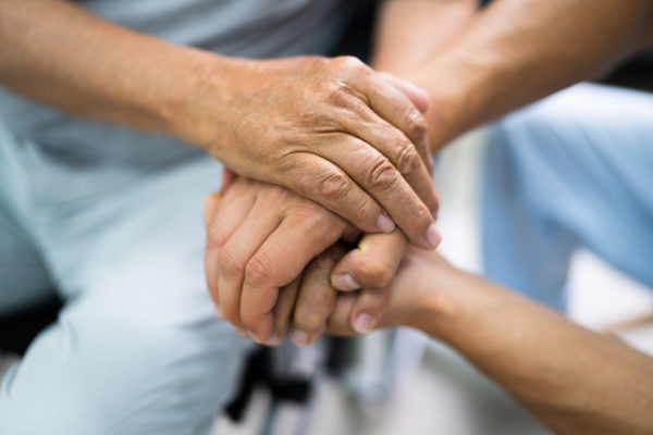 Elder Law Lawyer Bergen County, NJ - nurse holding elderly hand